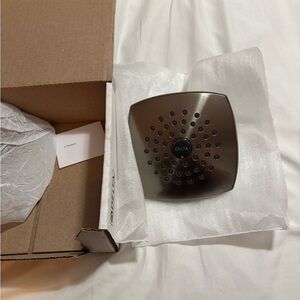 Delta Brushed Metal Shower Head